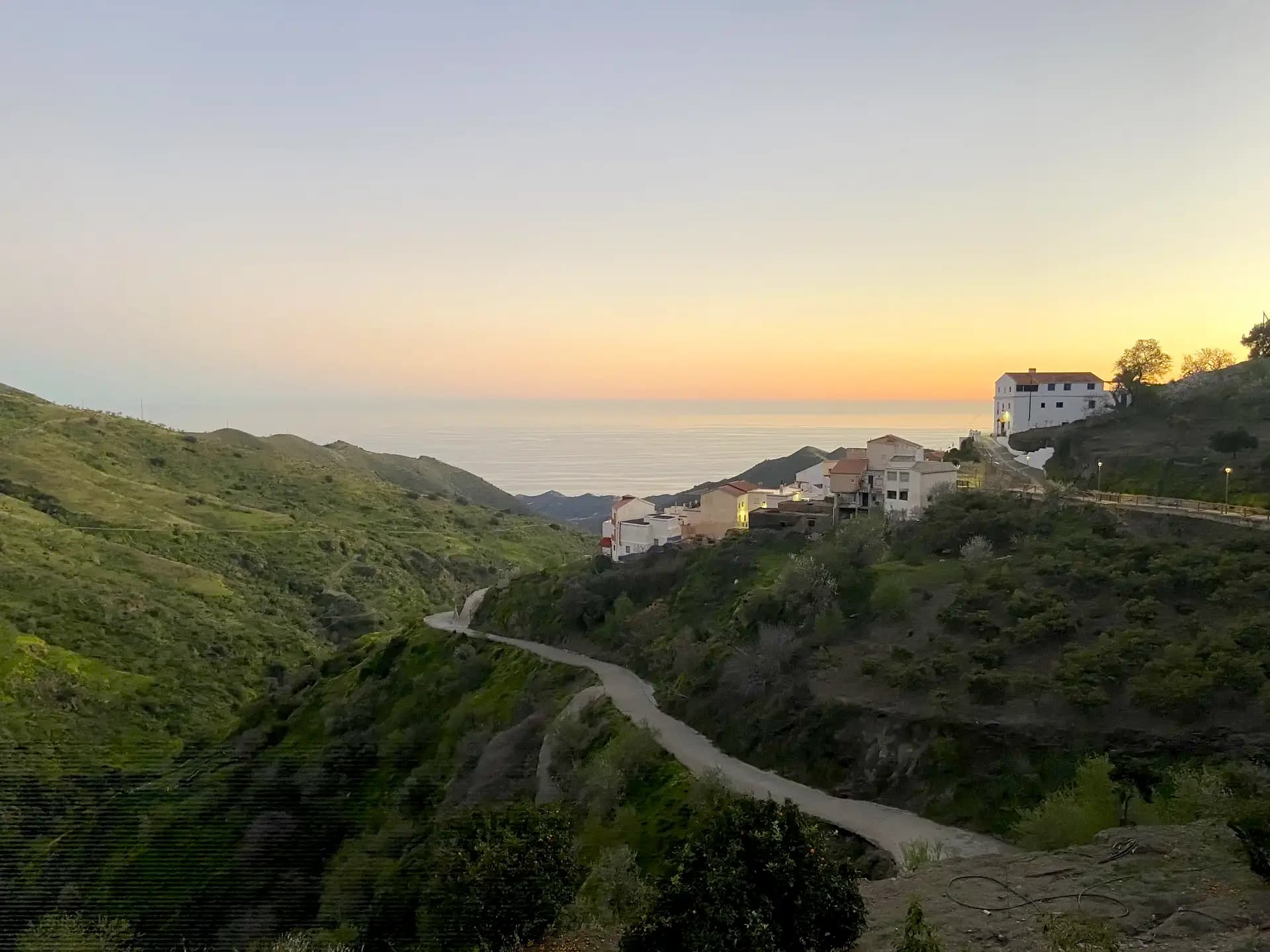 Andalusian hills at sunset with a view to the sea