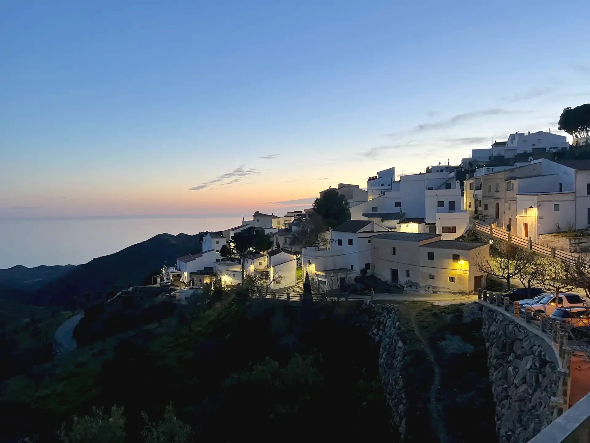 Andalusian white village at sunset near Granada, Spain